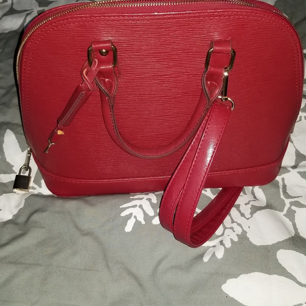 Handbag with lock and key